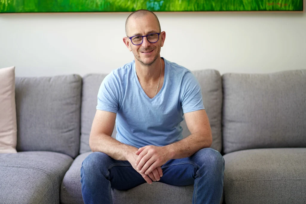 Marc Wiesner relaxed on a sofa in his coaching space